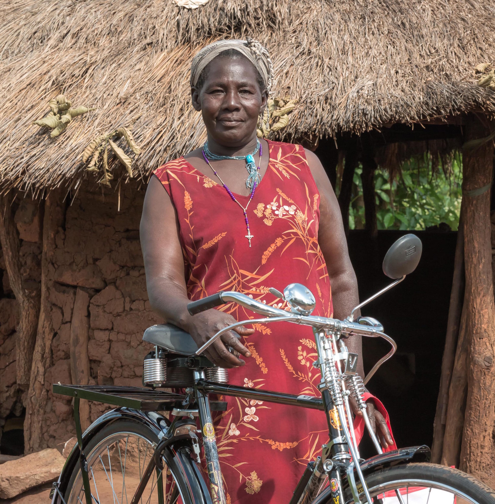 Cycle Connect client with a bicycle, investing in her family's future